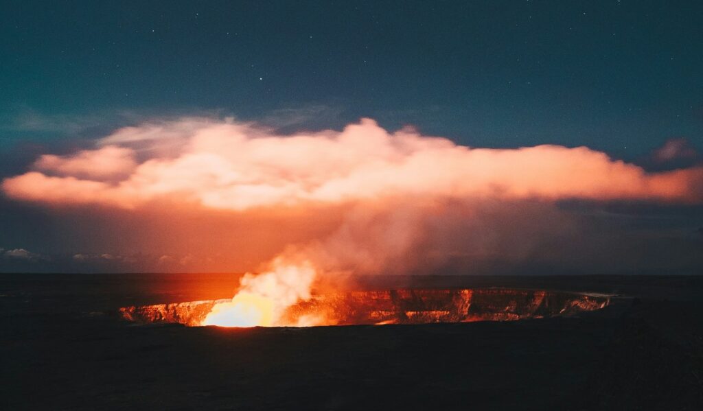 Bonfire against white clouds - Hawaiian’s most active volcano in Big Island.