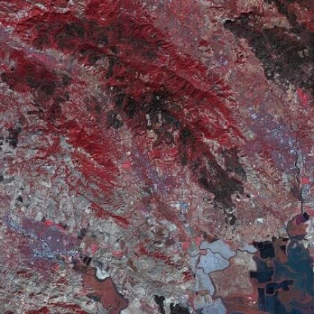 Fire scar on the Northern California landscape. This image, acquired October 21, 2017 by NASA's ASTER  instrument, depicts vegetation in red, while burned areas appear dark gray.