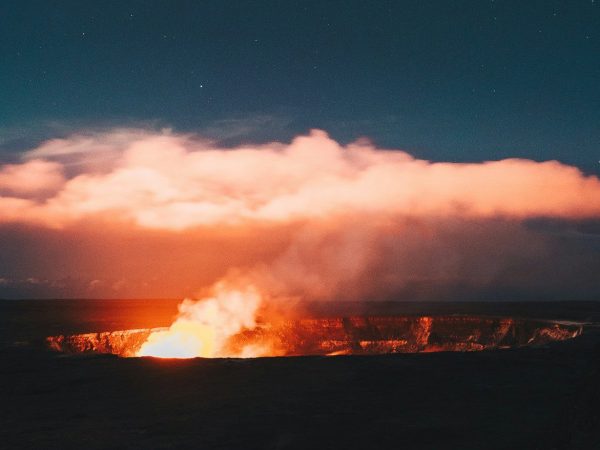 Bonfire against white clouds - Hawaiian’s most active volcano in Big Island.